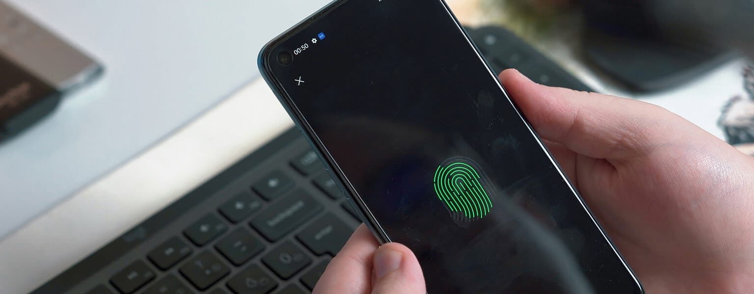 Person using multi-factor authentication on phone to login